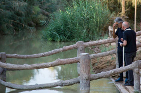 Andrea Bocelli Prays at Jordan River Site of Jesus’ Baptism.png