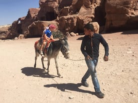 Jordan-Petra-Riding-Donkeys-through-the-Lower-Siq.gif